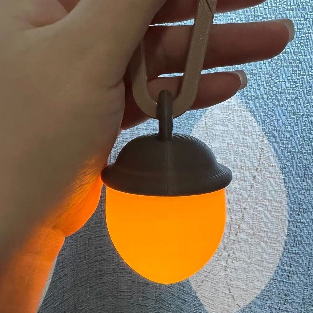 “Yahaha” Acorn Glow Lantern – Adventure-Inspired Backpack Charm Light
